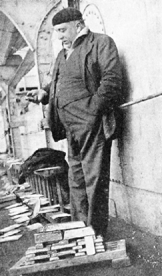 Commendatore Quaglia is seen standing by the first gold bars recovered. A few hours later bullion worth £80,000 was picked up.