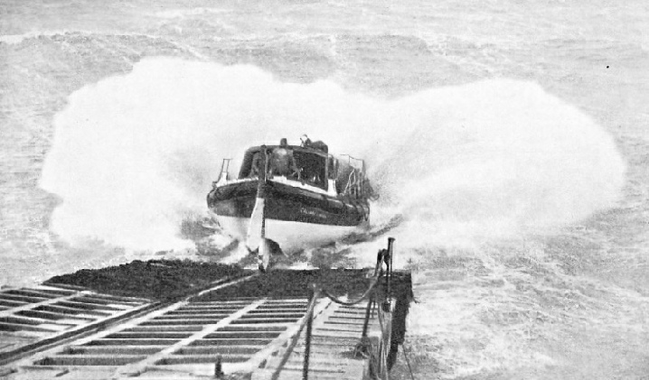 A spectacular picture of the Cromer motor lifeboat being launched 