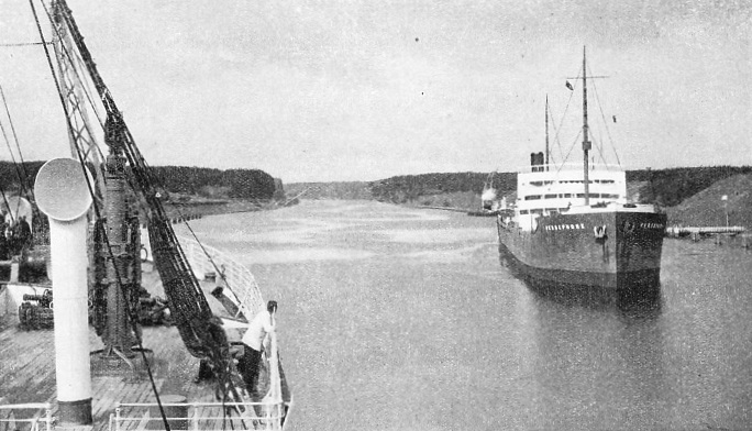 A TYPICAL REACH of the Kiel Canal between Rendsburg and the entrance at Kiel