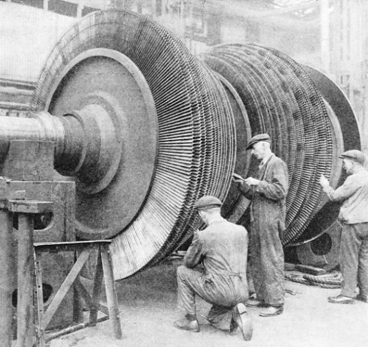 A MANY-BLADED ROTOR for one of the Queen Mary's low-pressure turbines 