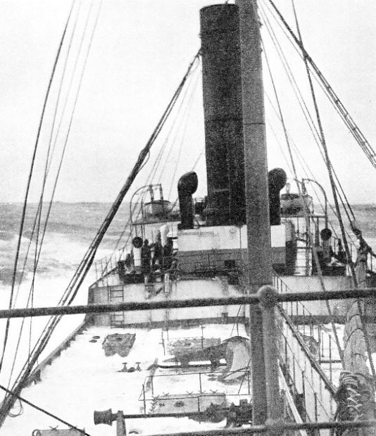 HE SEAS RECEDING from the low amidships deck of the oil-tanker F. A. Tamplin