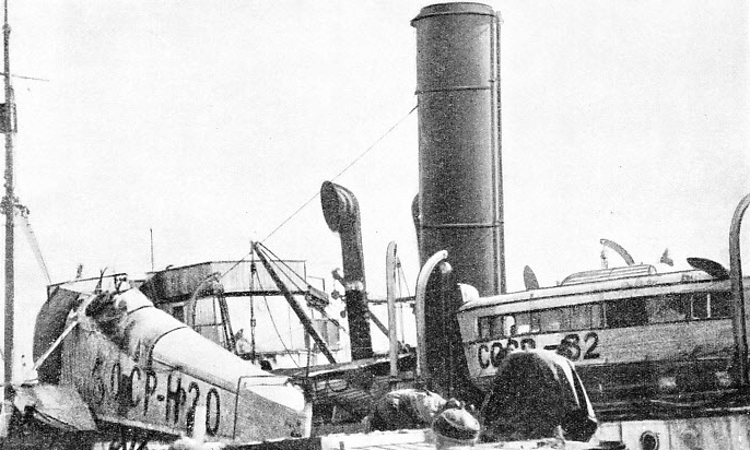 UNLOADING THE SEAPLANE FROM THE CHELYUSKIN