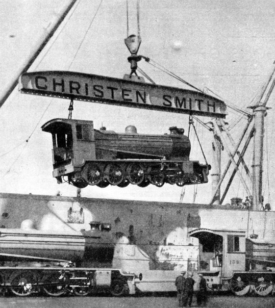 The ship Belpareil lifting a complete locomotive on board