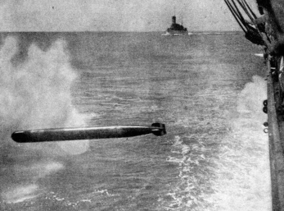 FIRING A TORPEDO from H.M.S. Cornwall