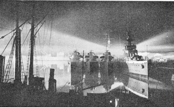 A SEARCHLIGHT DISPLAY in the naval dockyard at Chatham during Navy Week