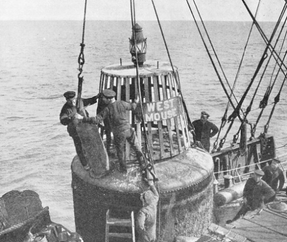 A CYLINDER OF GAS being lifted from the West Mouse Buoy