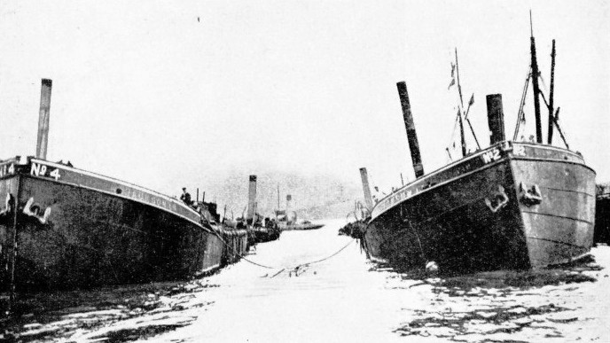 BETWEEN THESE LIFTING VESSELS the UC 44 was brought ashore