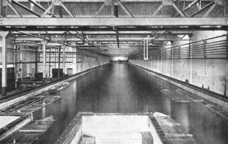 A MILLION AND A QUARTER GALLONS of water are contained in the Alfred Yarrow Testing Tank at Teddington, Middlesex
