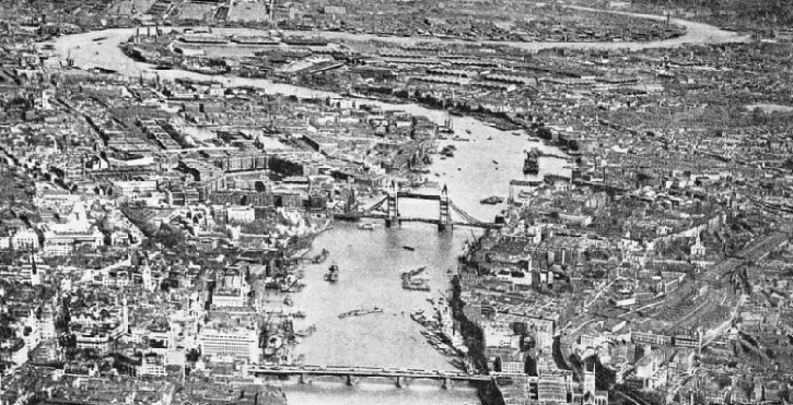 LOOKING EAST along the winding course of the River Thames towards the Tower Bridge