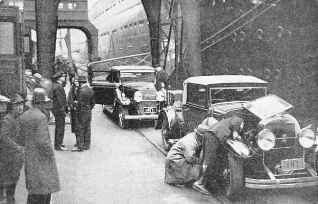 CUSTOMS OFFICERS EXAMINING MOTOR CARS at Southampton