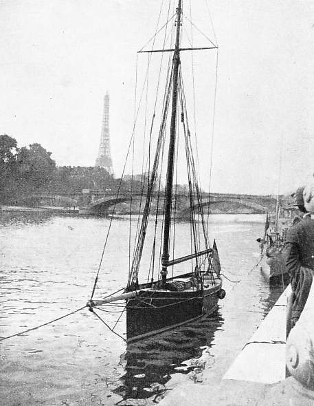 A picturesque view of the yacht Firecrest moored on the River Seine