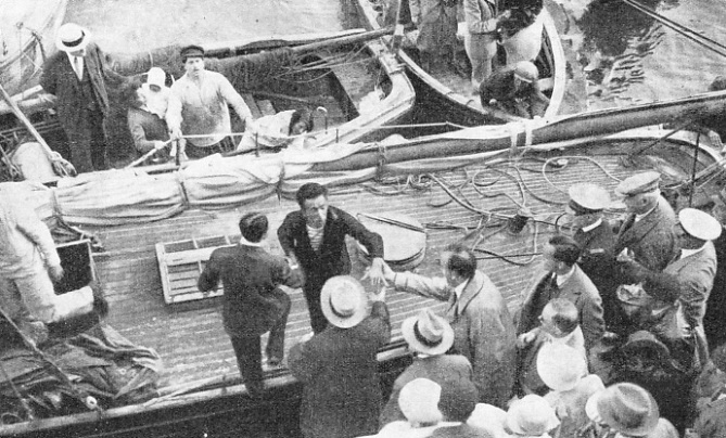 AN ENTHUSIASTIC CROWD thronged the quay at Le Havre to greet Alain Gerbault when he landed