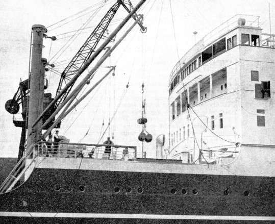 Barrels of cement being loaded at the Royal Docks System in the Port of London