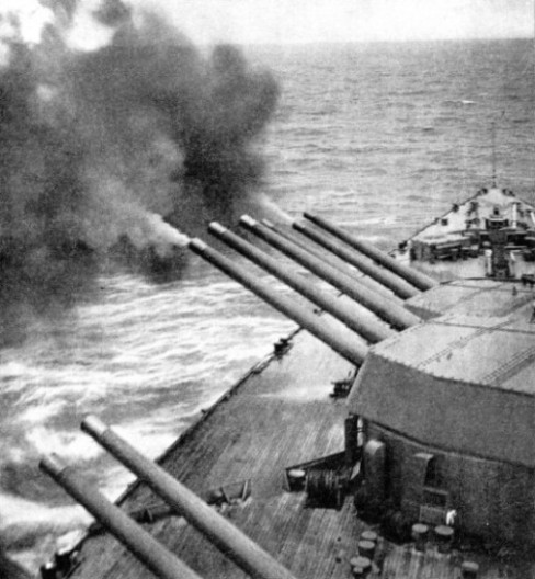 FIRING A BROADSIDE of nine guns from H.M.S. Rodney