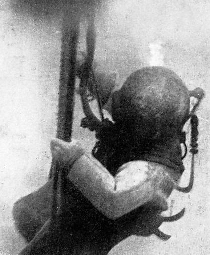 A REMARKABLE UNDER-WATER PHOTOGRAPH of an American naval diver