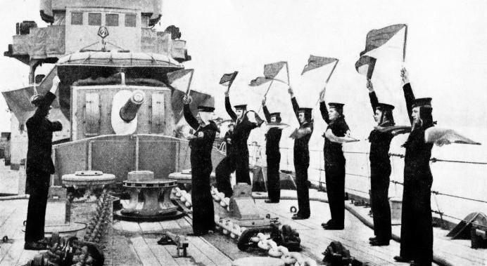 SIGNALLING INSTRUCTION being given to men of the Royal Naval Volunteer Reserve on board H.M.S. Curacoa 